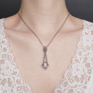 Antique white pearl and silver basket necklace with a small silver chain